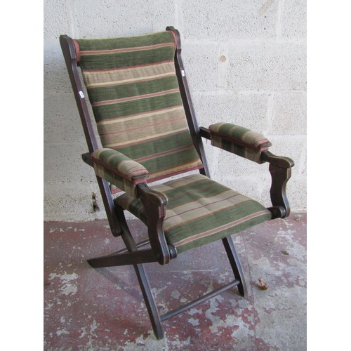 1577 - An Edwardian Baveystock patent campaign type folding elbow chair, stamped to frame, with banded cove... 