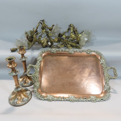 566 - A copper tray with silver plated grape vine edging and a pair of candlesticks similar, together with... 