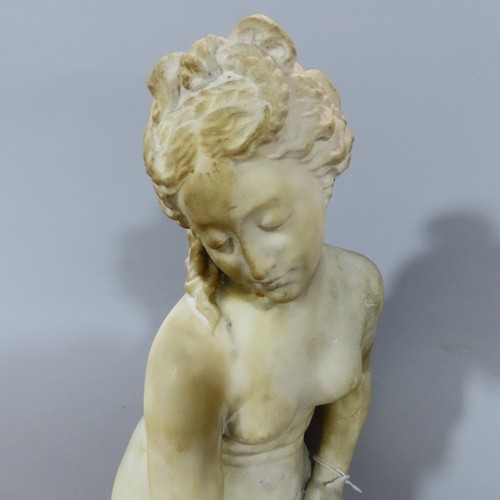 569 - A sculpture after Joseph Frugoni of Venus Bathing, detached from its circular base, 59cm high.