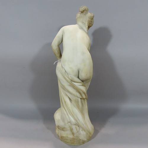 569 - A sculpture after Joseph Frugoni of Venus Bathing, detached from its circular base, 59cm high.