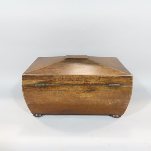 578 - A Regency rosewood sarcophagus shaped tea caddy with brass fittings (void)