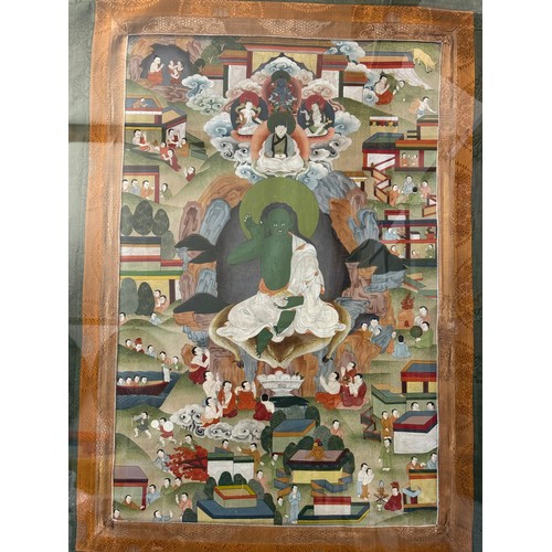 1906 - A 20th century Tibetan Thangka depicting the poet Milarepa, polychrome pigments on textile, with an ... 