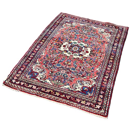 6006 - A Persian floral rug 152cm x 110cm