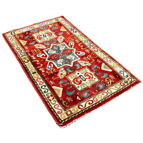 6047 - A Vintage Tetex rug with Causcasian design 155cm x 95cm approximately