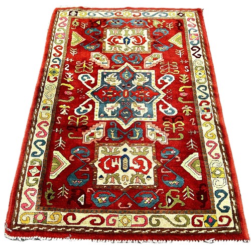 6047 - A Vintage Tetex rug with Causcasian design 155cm x 95cm approximately