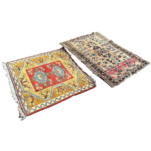 6022 - A Kazak type rug with a central pink panel , 110cm x 105cm and another Persian carpet with a floral ... 