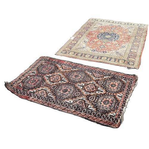 6039 - A Persian style carpet with a central medallion with a floral ground, 196cm x 130m together with a s... 