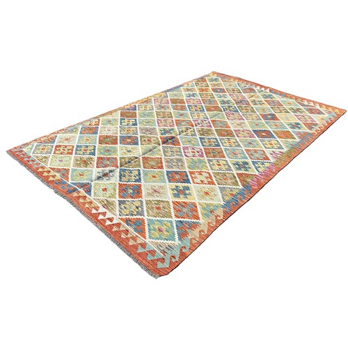 1609 - An Anatolian Turkish Kilim, with a multicoloured all over geometric diamond pattern,302cm x 204cm ap... 