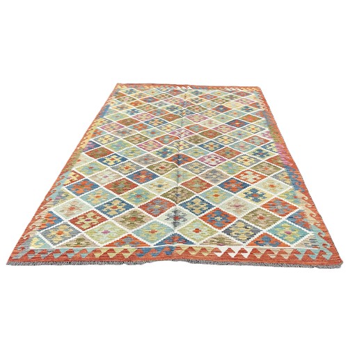 1609 - An Anatolian Turkish Kilim, with a multicoloured all over geometric diamond pattern,302cm x 204cm ap... 