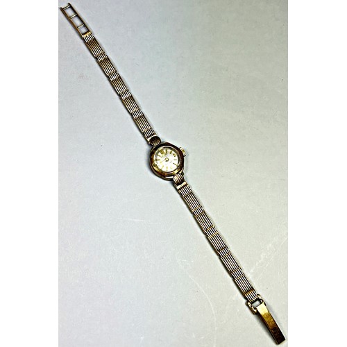 427 - A lady’s vintage Enicar ‘Ultrasonic’ 9ct yellow gold wristwatch, 12mm case, on 9ct yellow gold strap... 