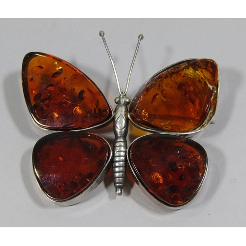 376 - Collection of costume jewellery to include a large silver butterfly brooch set with amber (af), thre... 