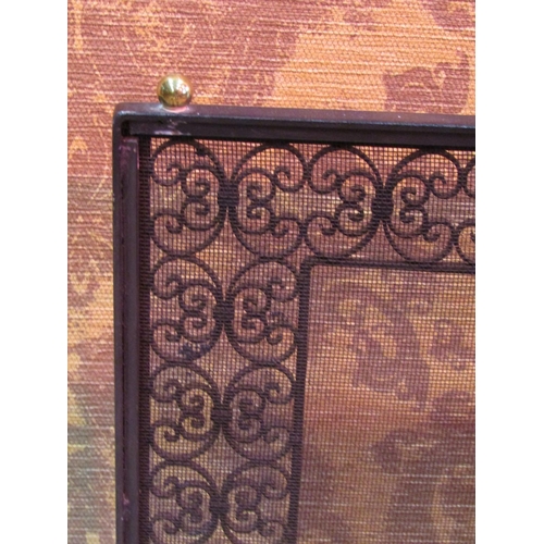 1067 - A polished brass fire fender with decorative pierced fretwork grill, 18 cm high x 130 cm together wi... 