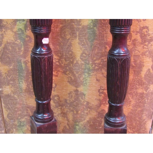 1131 - A pair of 19th century Hepplewhite style bed posts with reeded and leaf detail