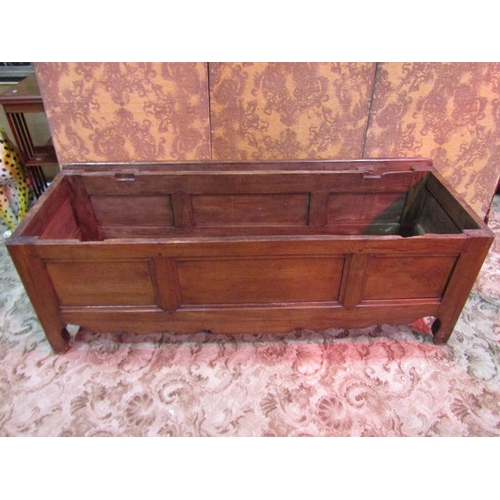 1146 - An antique oak coffer with loose lid over, rectangular moulded panels with shaped apron supports, 60... 