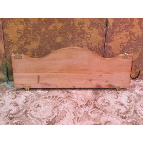 1180 - A stripped pine wall shelf/coat rack with carved acorn and oak leaf detail, 31 cm high x 82 cm x 13 ... 