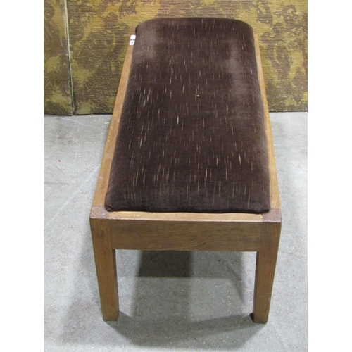 1329 - A simple oak footstool with upholstered top, 30cm high x 77cm x 33cm together with a companion set (... 