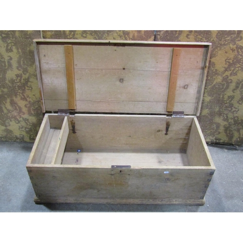 1331 - An old stripped pine box with hinged lid and ironwork carry handles, 35cm high x 104cm x 48cm