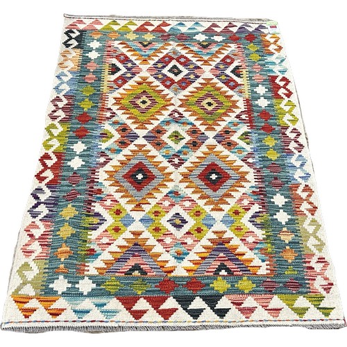 1628 - A Chobi kilim with multicoloured stepped diamonds, 149cm x 100cm approximately