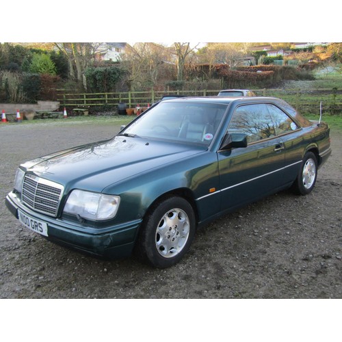 1490A - A Mercedes E320 Coupe, Automatic, petrol 3199cc, Reg N100 GRS, Green, Mileage 159900, 3 owners to da... 