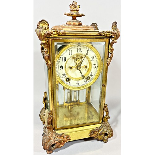 437 - A 19th century four pane table clock, the chapter ring with black Arabic numerals above mercury pend... 