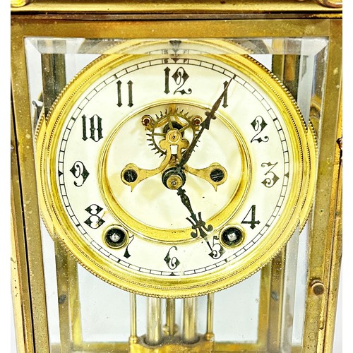 437 - A 19th century four pane table clock, the chapter ring with black Arabic numerals above mercury pend... 