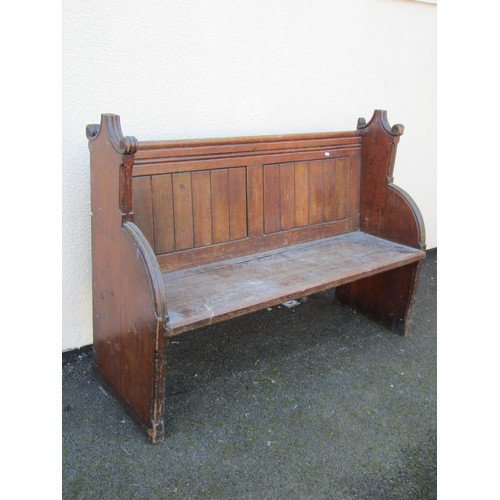 1587 - A 19th century ecclesiastical carved oak church pew, with scrolling terminals, 102 cm high, 140 x 45... 