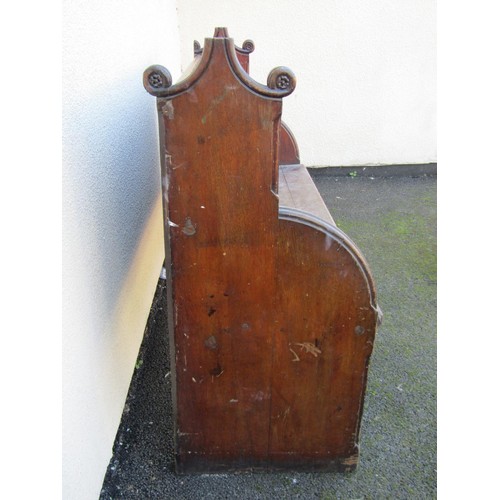 1587 - A 19th century ecclesiastical carved oak church pew, with scrolling terminals, 102 cm high, 140 x 45... 