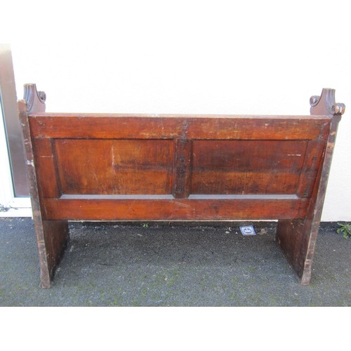 1587 - A 19th century ecclesiastical carved oak church pew, with scrolling terminals, 102 cm high, 140 x 45... 