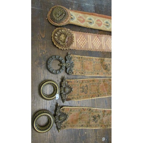 744 - Three Victorian bell pulls with brass grips and a further pair with hand worked tassels (5)