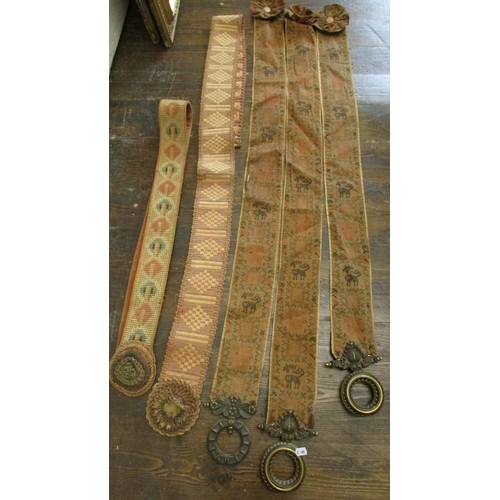 744 - Three Victorian bell pulls with brass grips and a further pair with hand worked tassels (5)