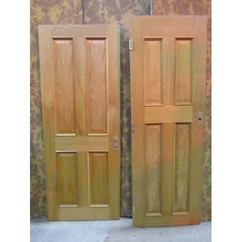 1073 - Five contemporary oak and oak faced internal doors with glazed and fielded panels, together with a f... 