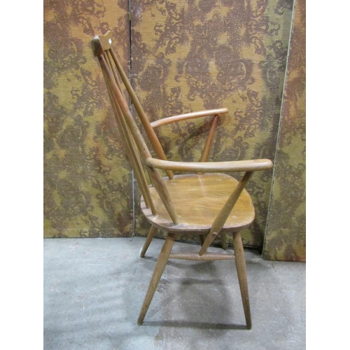 1209 - A vintage Ercol Goldsmith light elm and beechwood open armchair