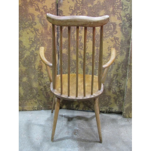 1209 - A vintage Ercol Goldsmith light elm and beechwood open armchair