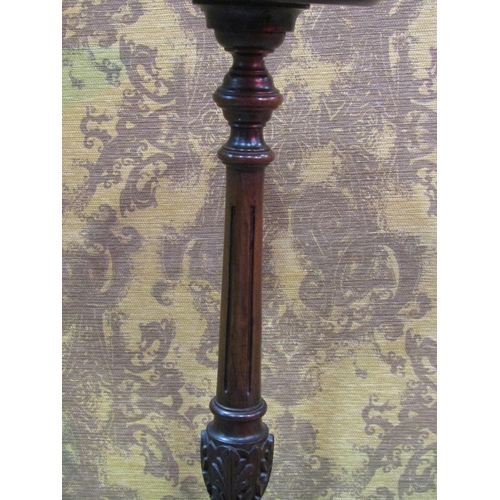 1239 - An unusual Edwardian mahogany torchere in the Georgian style raised on swept supports, 114cm high, t... 