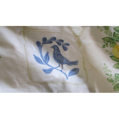 754 - A pair of good quality lined curtains in a Lemon Tree & Bluebird pattern - 220cm long x 400cm wide