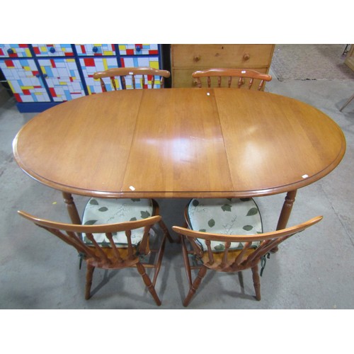 1205 - A contemporary stained beechwood D end dining table with single additional leaf together with a set ... 