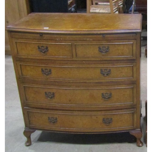 1187 - A Stag bedroom chest in the Georgian style of five long drawers raised on bracket supports, 116 cm h... 