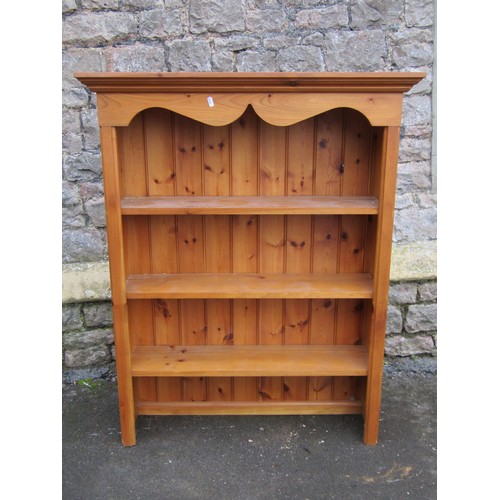 1199 - A Victorian stripped pine country made chest of two short and three long drawers raised on bun feet,... 