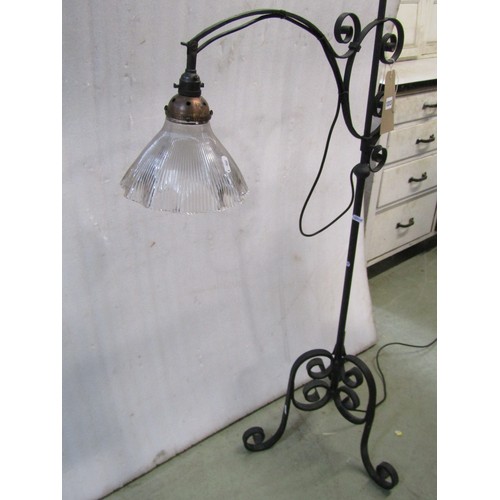 1313 - An adjustable iron work standard lamp with scrolled detail, 164cm high