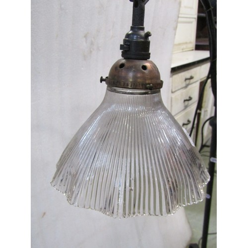 1313 - An adjustable iron work standard lamp with scrolled detail, 164cm high