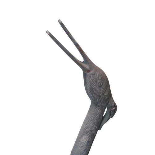 1025 - A heavy gauge cast metal garden ornament in the form of a stork, 95 cm high