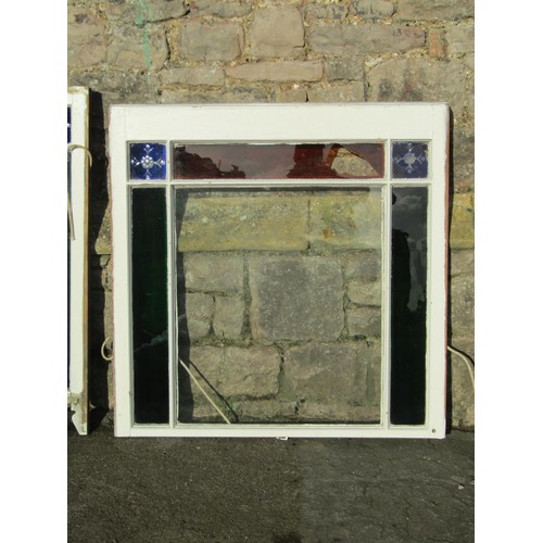 1039 - Two reclaimed painted pine framed sash windows enclosing coloured glass panels (af), 96 cm high x 90... 