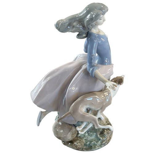 83 - A Lladro figure 5855 - Afternoon Jaunt, 27cm