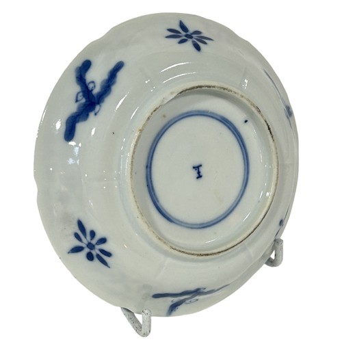 71 - A small Chinese blue and white dish decorated with carp, shrimp and floral detail, 12.5cm diameter t... 