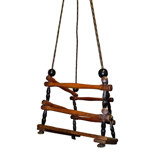 1018 - A vintage timber child's swing with turned rails