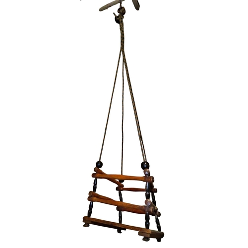 1018 - A vintage timber child's swing with turned rails