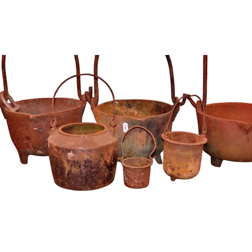 1050 - Six vintage cast iron glue/smelting pots with loose loop handles