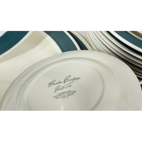 65 - A group of Susie Cooper dinner wares ‘Meadowsweet’ pattern (2370) to include graduated meat plates, ... 