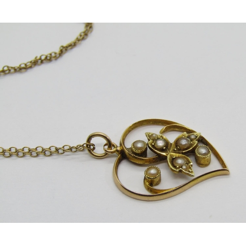 307 - Edwardian 15ct heart shaped pendant set with seed pearls, hung from a period 9ct chain necklace, 2.9... 