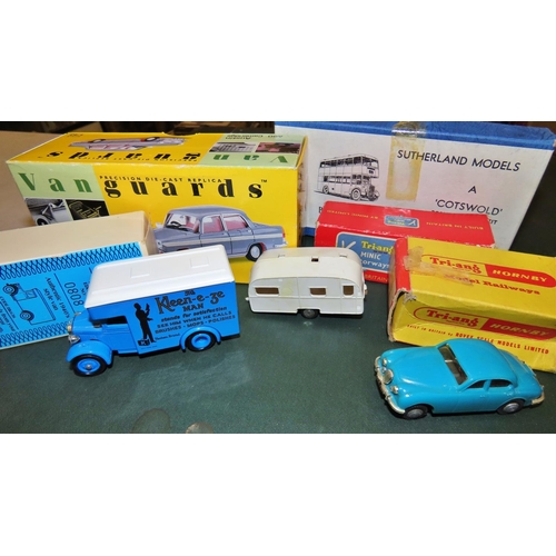 768 - Minic set of track five cars and a caravan, together with Electric Derby and treble 'O'Electric rail... 